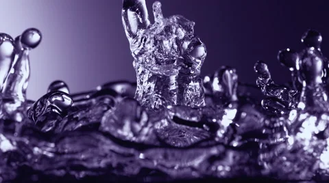 Water surface bouncing and making splashes. Slow Motion. Stock Footage 67423684