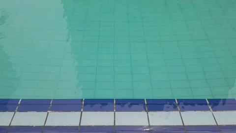 Water surface flowing and reflection in swimming pool. Video stock 273972215