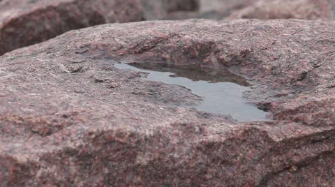 Water on the surface of the granite Stock Footage 37218277
