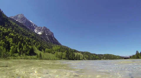 Water surface of lake with mountain in background. Video stock 38731644