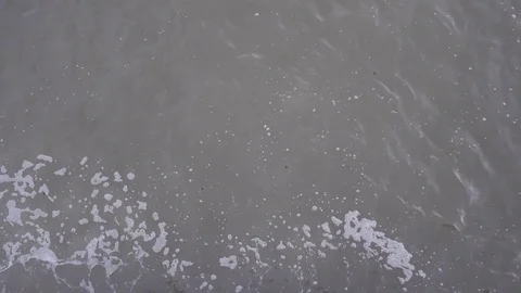 Water surface meets the pier Stock Footage 82702307