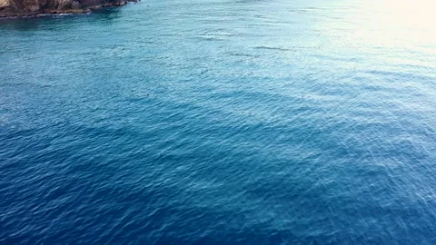 Water surface of ocean, Amed bay coastline, Aerial view. Indonesia, Bali. Stock Footage 135809237