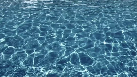 Water surface of the pool from above. Clear blue water with light reflections Stock Footage 317998452