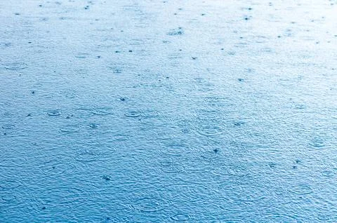 Water surface in the pool with raindrops 1 Stock Photos