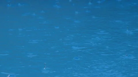 Water Surface in the Pool with Raindrops Видео 44172551