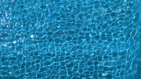 Water surface in the pool. Swimming pool background. Blue water texture. Stock Footage 277853252