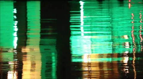 Water surface rflects multicolored changing lights in abstract motion Stock Footage 41196766