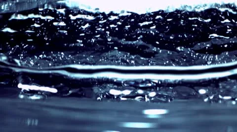 Water surface in slow motion - 02 - High Speed 1050 fps Stock Footage 11612521