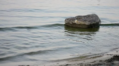 Water surface with small waves and stone Video stock 54924683