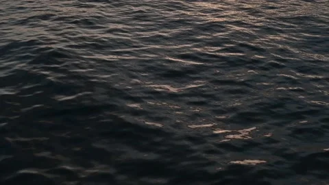 Water surface with small waves during sunset 스톡 동영상 152597771