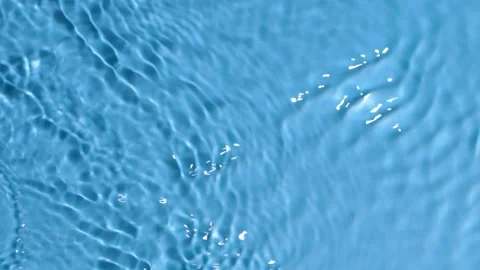 Water surface splash, ripple wave texture. Light reflection top view slow motion Stock Footage 166259321