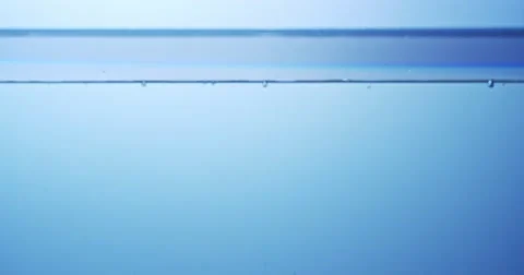 Water surface splash, slow motion in 4k uhd resolution graded from CinemaDNG Vidéo 48387472