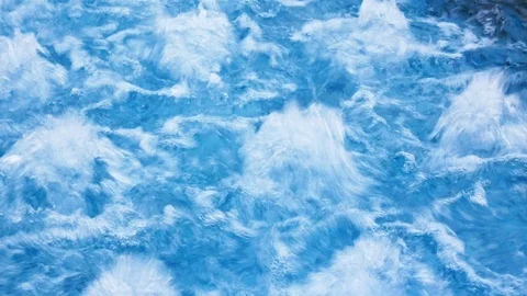 Water surface splashing and bubble rising in swimming pool Stock Footage 100532058