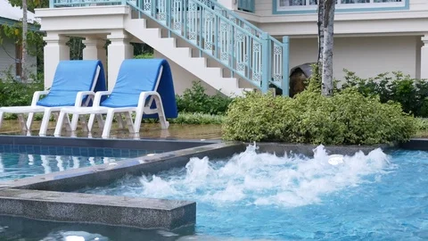 Water surface splashing and bubble rising in swimming pool Stock Footage 100568573