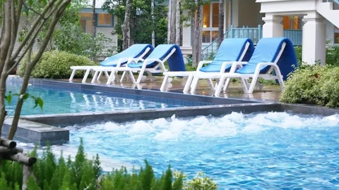 Water surface splashing and bubble rising in swimming pool Stock Footage 100568622