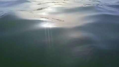Water surface with Sun reflection, sea side summer video close up Stock Footage 200202353