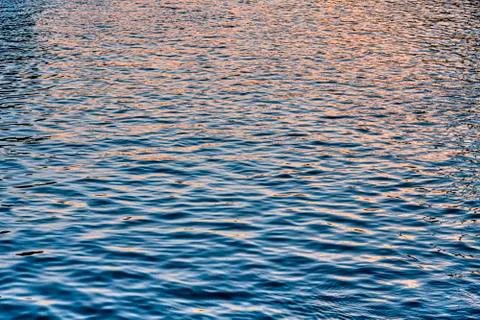 Water surface in sunset for backgrounds Stock Photos