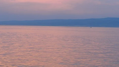 Water surface at sunset from moving boat Stock Footage 119227617
