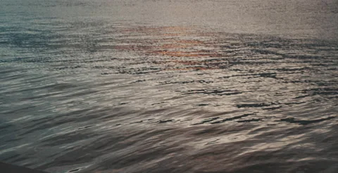Water surface at sunset in slow motion Stock Footage 204916001