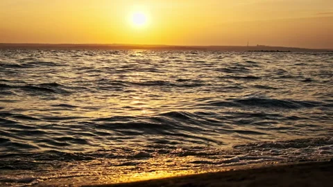 Water Surface at Sunset in Slow Motion Stock Footage 252568623