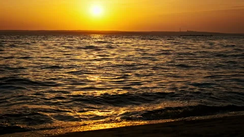 Water Surface at Sunset in Slow Motion Stock Footage 253380898