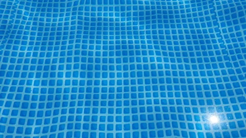 Water surface texture with looping clean swimming pool ripples and waves. Stock Footage 134952503