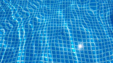 Water surface texture with looping clean swimming pool ripples and waves. 写真素材