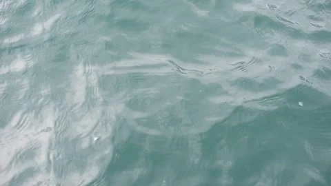 Water surface texture, Slow motion looping green river natural water top view Stock Footage 96739389