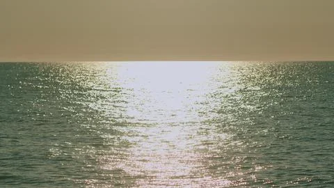 Water Surface Texture. Surface Is Covered With Sparkling Ripples And Creates A Stock Photos