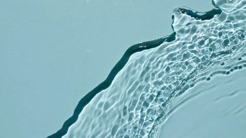 Water surface texture top view. Water splash blue colored. Pure blue water with Stock Footage 158118057