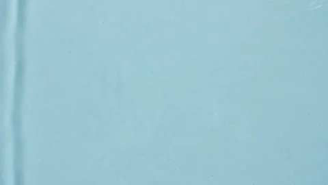 Water surface texture top view. Water splash blue colored. Sun and shadows. Pure Stock-Footage 158773604