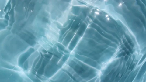 Water surface texture top view. Water splash blue colored. Pure blue water with Stock Footage 162812156