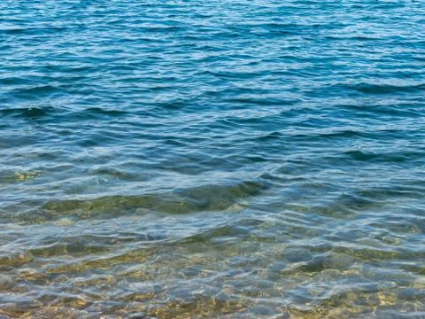 Water surface with water waves background texture 스톡 사진