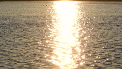 Water surface wave sunrise light reflection, cinematic look Stock Footage 255665379