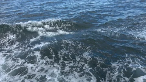 Water surface with waves and ripples from a moving boat. Stock Footage 238647370