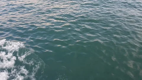 Water surface with waves and ripples from a moving boat. Stock Footage 249173267