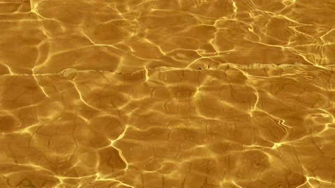 Water surface with waves and small ripples from the wind with a caustic effect Stock Footage 104014988