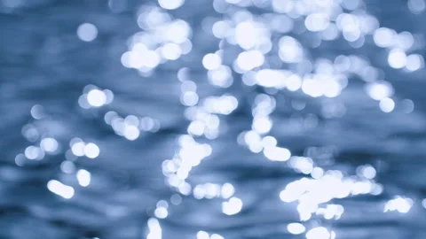 Water surface waves - close-up of light spots Stock Footage 257295379