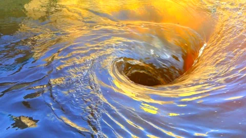 https://images.pond5.com/water-swirling-down-colorful-mysterious-footage-133285584_iconl.jpeg