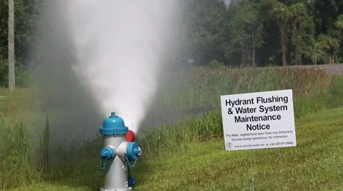 Water System Maintenance Sign with Flushing Fire Hydrant Stock Footage 52888704