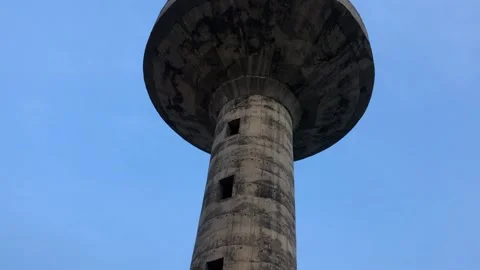 Water Tank from Bottom View – Concrete Structure Tower Against Sky 스톡 동영상 344641906