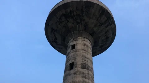 Water Tank from Bottom View – Concrete Structure Tower Against Sky Stock Footage 344641907