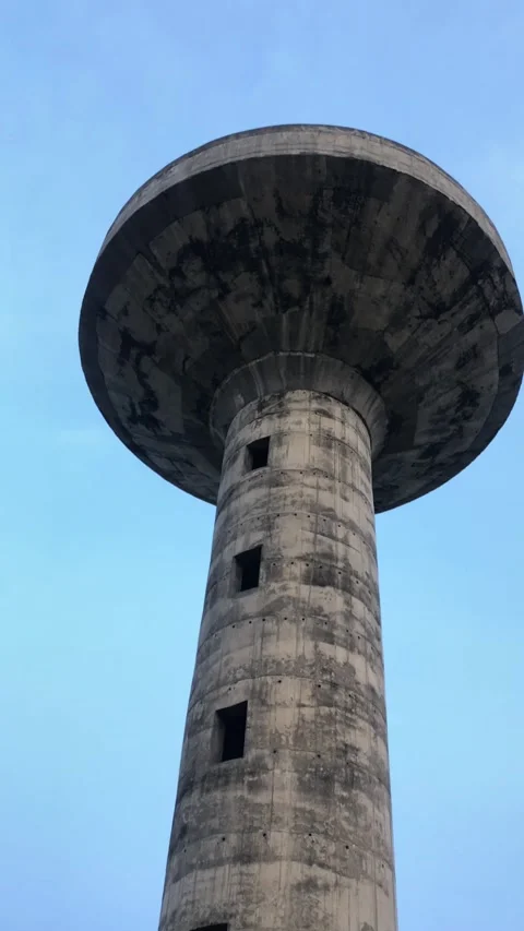 Water Tank from Bottom View – Concrete Structure Tower Against Sky 스톡 동영상 344642387