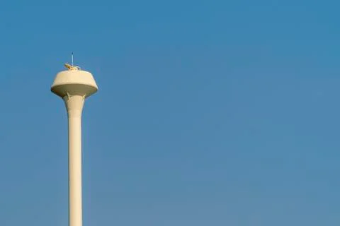 Water tank tower with blue sky background Stock Photos