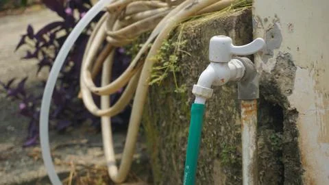 Water Tap in Backyard Setting Stock Photos