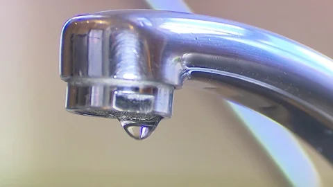 Water from a tap - close up Video stock 72109198