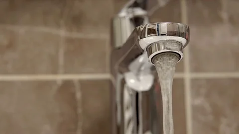 Water tap with flowing water. loop background Stock Footage 76331816