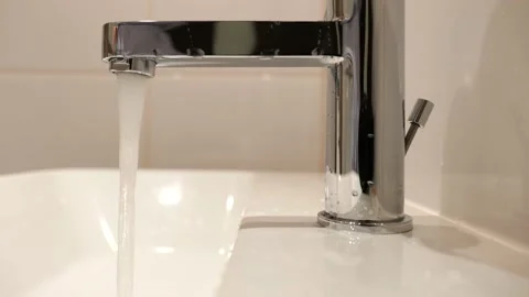 Water tap with flowing water. Selective focus Stock-Footage 158447218
