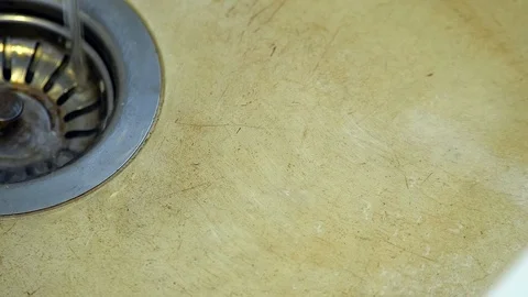 Water from a tap goes down the drain Stock-Footage 100975511