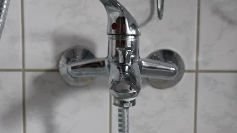 The water tap is running. Stock Footage 156553491